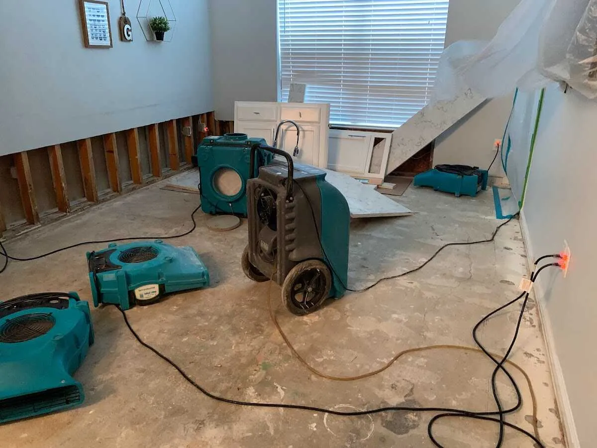 Dehumidifier in flood-cut room for Water Damage Restoration in Riverbank